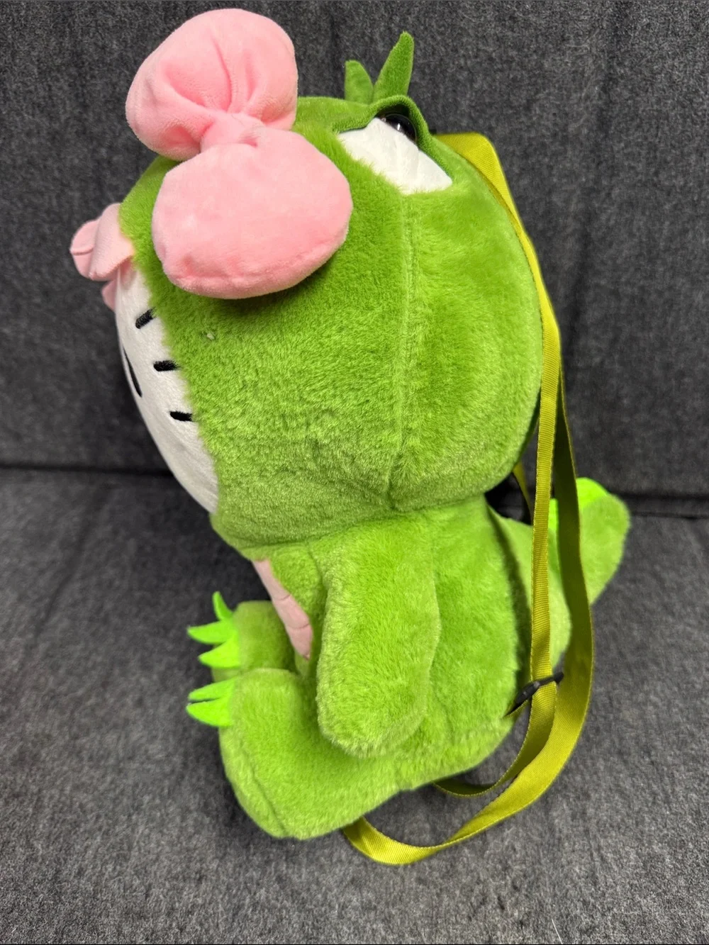 Sanrio Hello Kitty Plush in Green Dino Outfit with Pink Trim